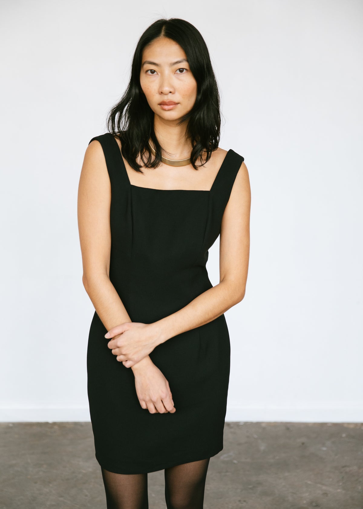 Vintage 1990s minimalist little black dress with square neckline in black