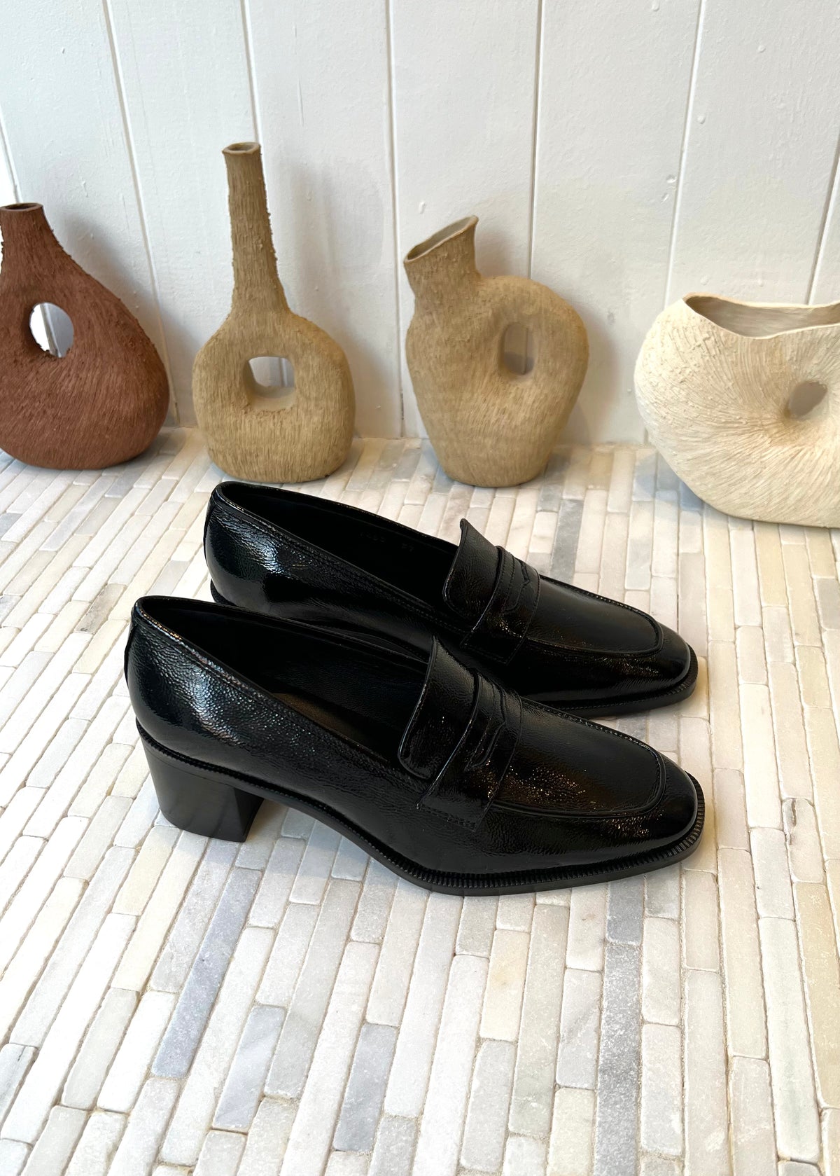 Alice Heeled Penny Loafer in Black Patent Leather